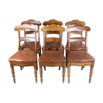 Set of eight late empire chairs in high quality brown leather in mahogany