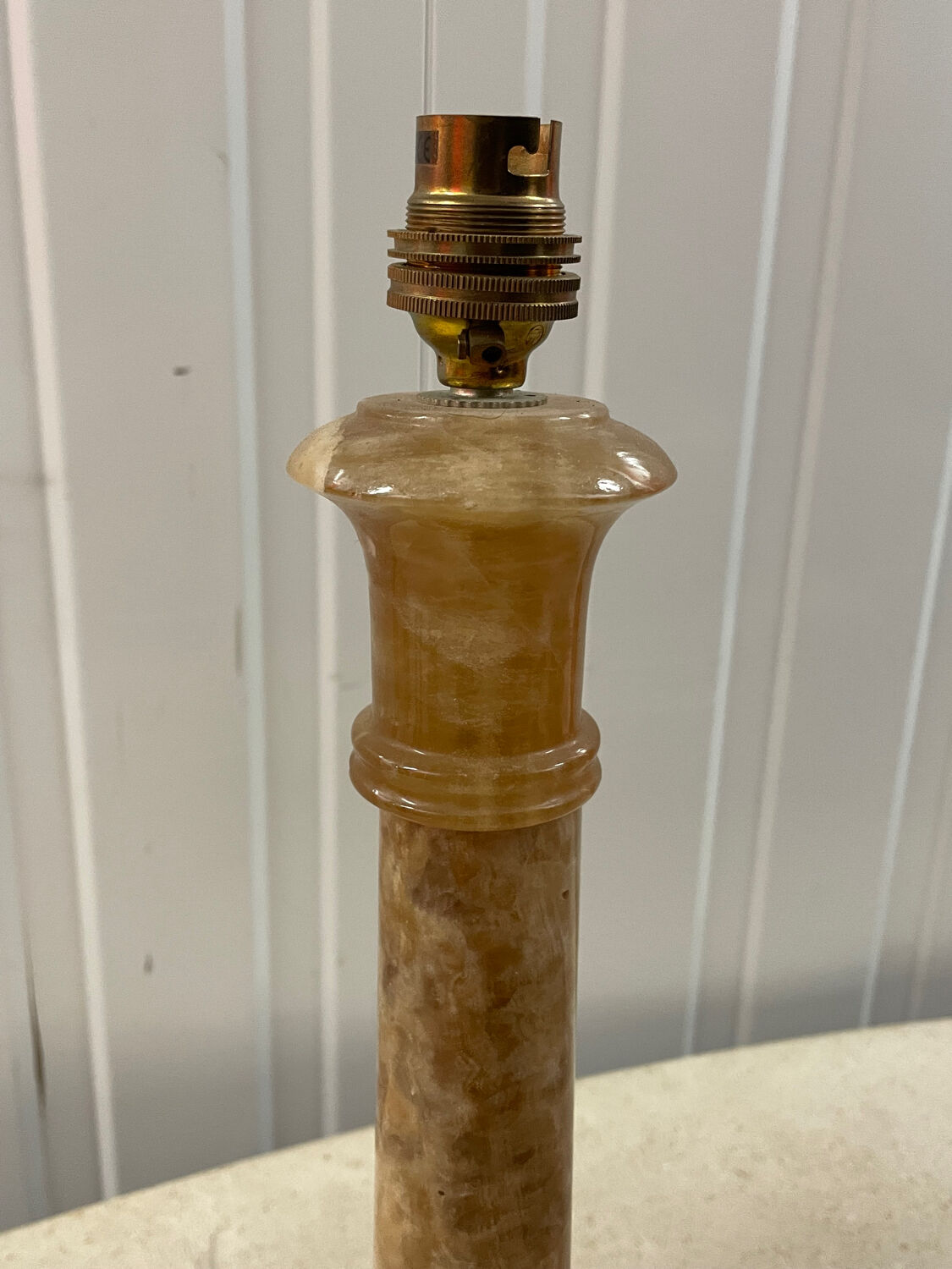 Pair of candlesticks in yellow sienna marble