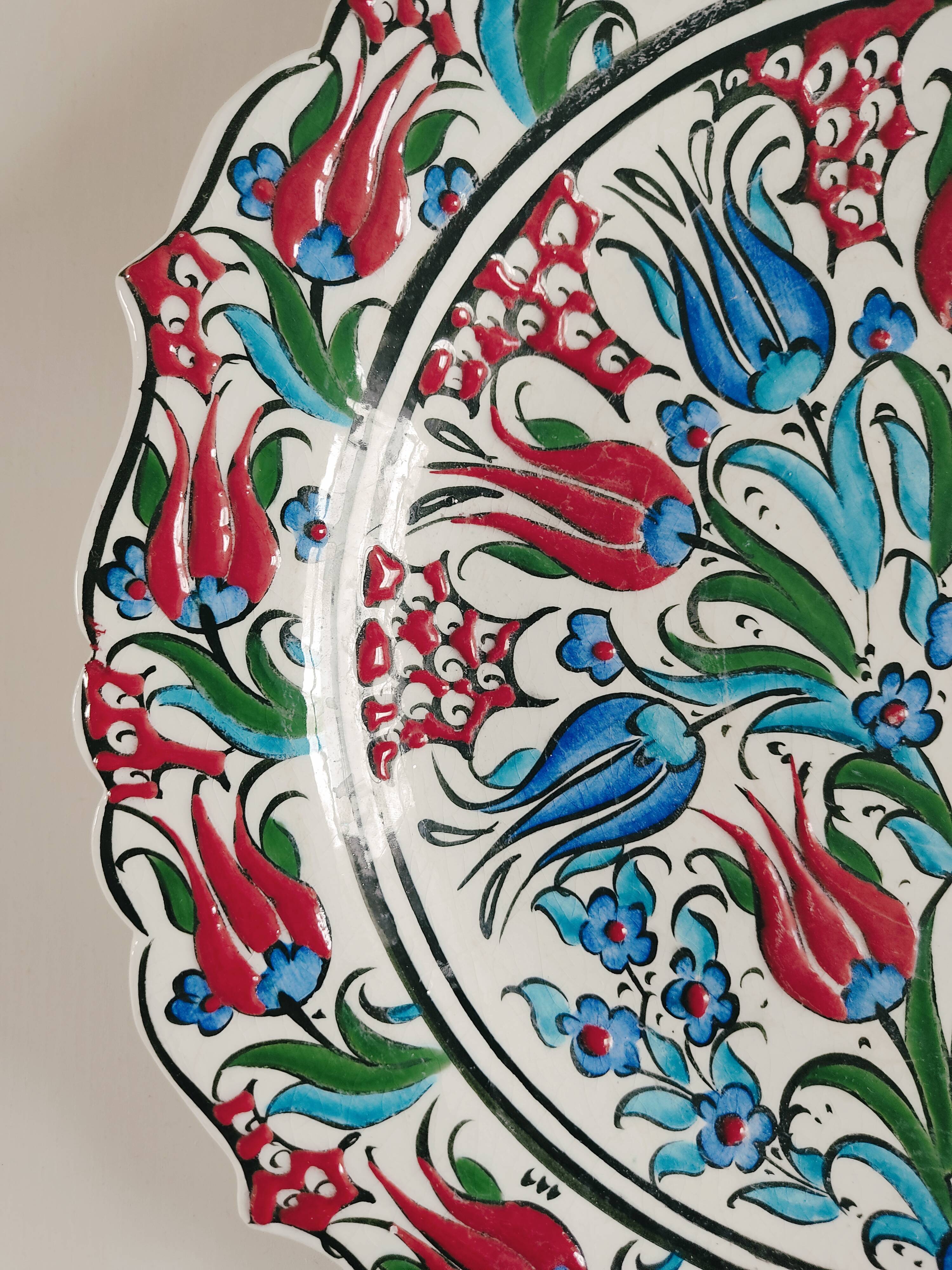 Empty pocket decorated with red and blue flowers