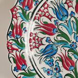 Empty pocket decorated with red and blue flowers