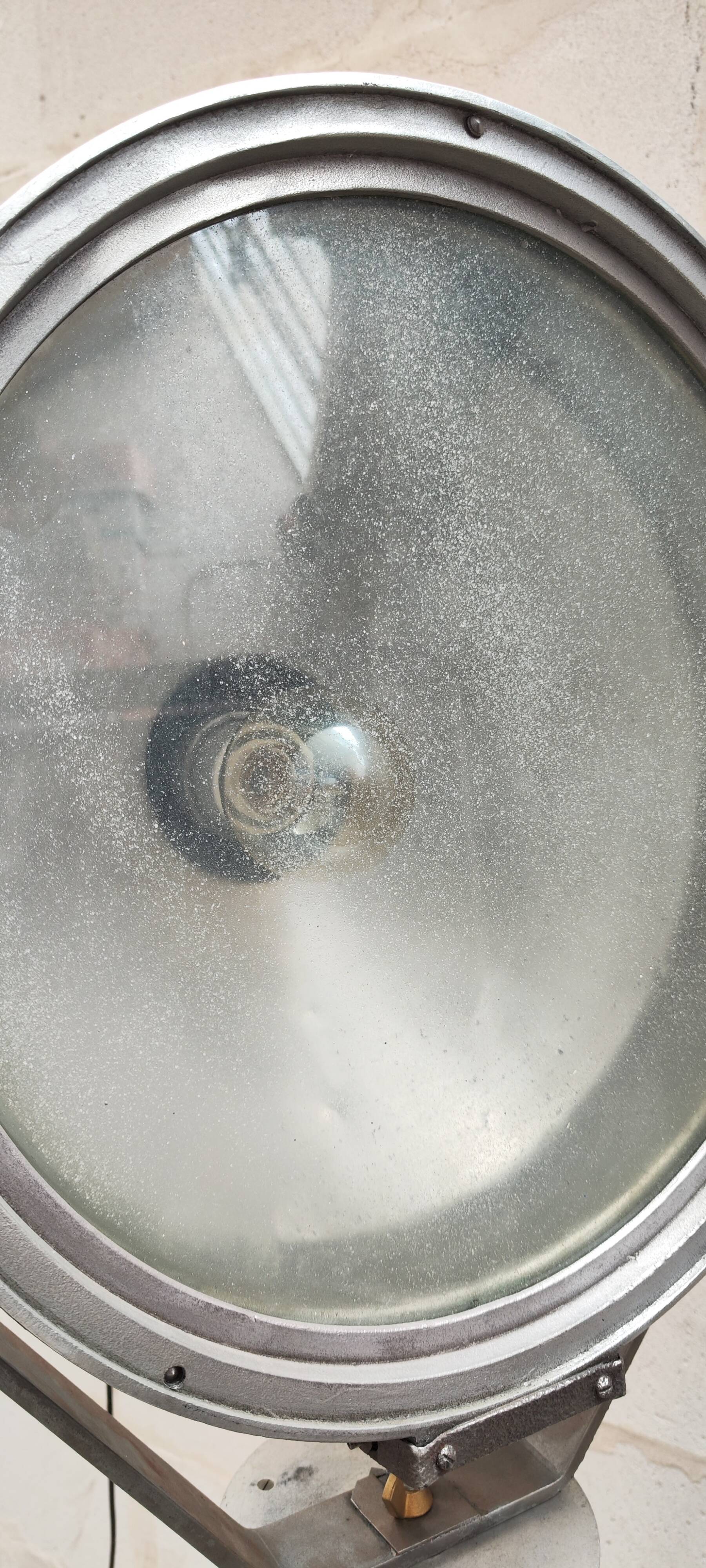 Old Mazda projector on wooden tripod