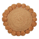Mini round cushion with ochre wool pompoms