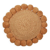 Mini round cushion with ochre wool pompoms