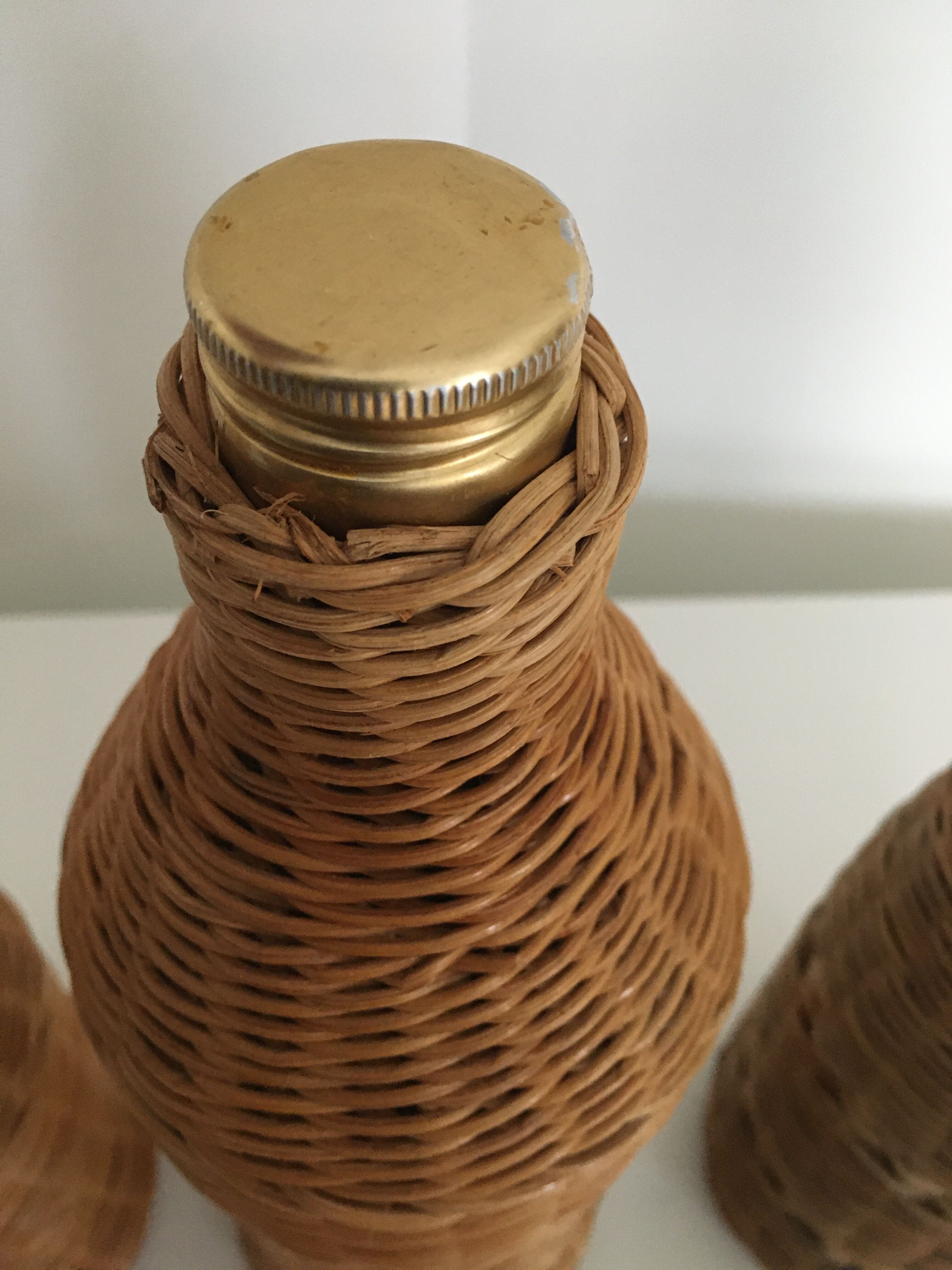 Set of 3 rattan bottles