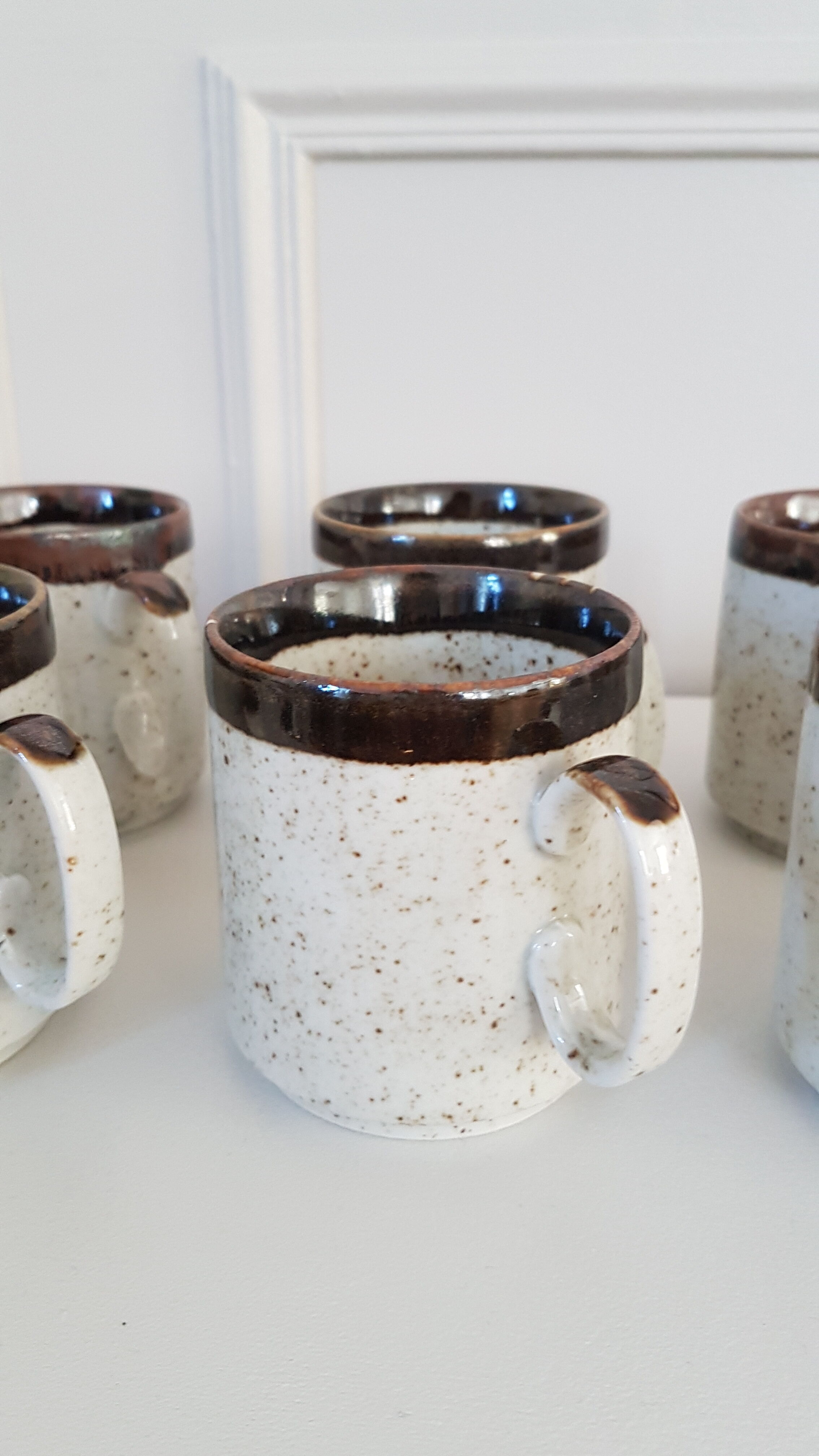 Six stoneware mugs
