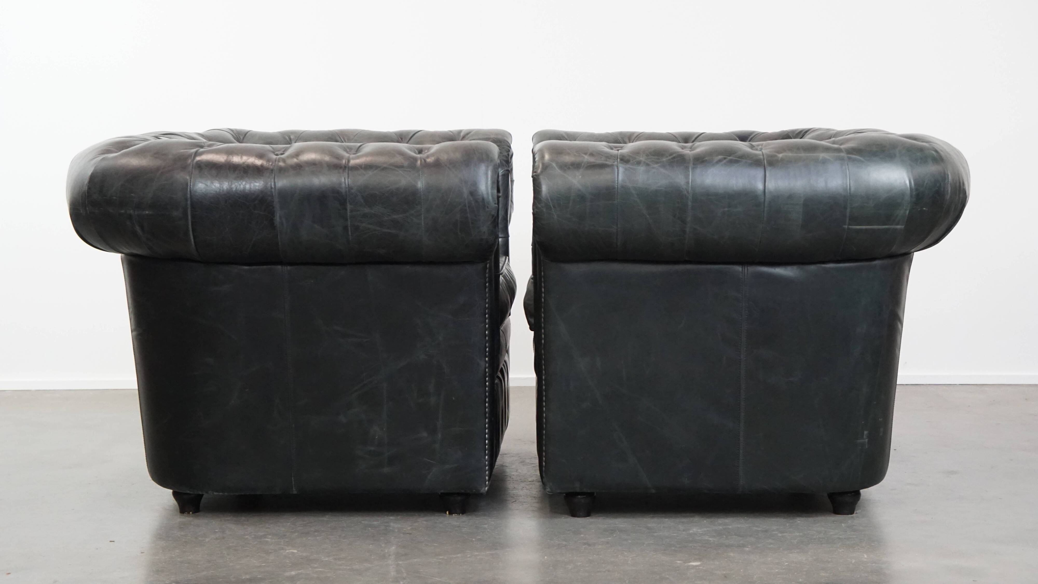 Set of 2 black Chesterfield armchairs in grained cowhide leather