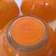 Five old orange duralex bowls