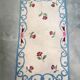 Tapis en laine blanc et bleu fleuri