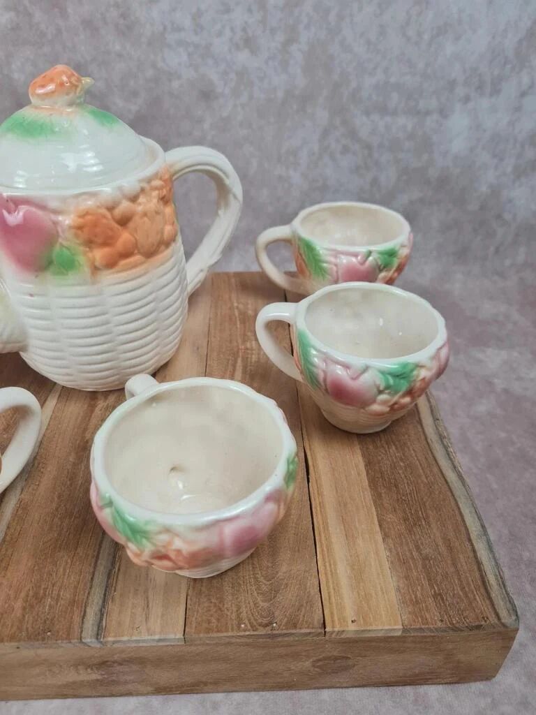 Adorable little vintage tea set in coloured earthenware.