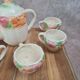 Adorable little vintage tea set in coloured earthenware.
