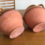 Pair of vintage terracotta watering cans