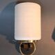 Pair of wall lights in gilded brass, black metal and opaline, 1960