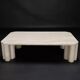 Table basse en travertin de l'éditeur italien Up&Up.