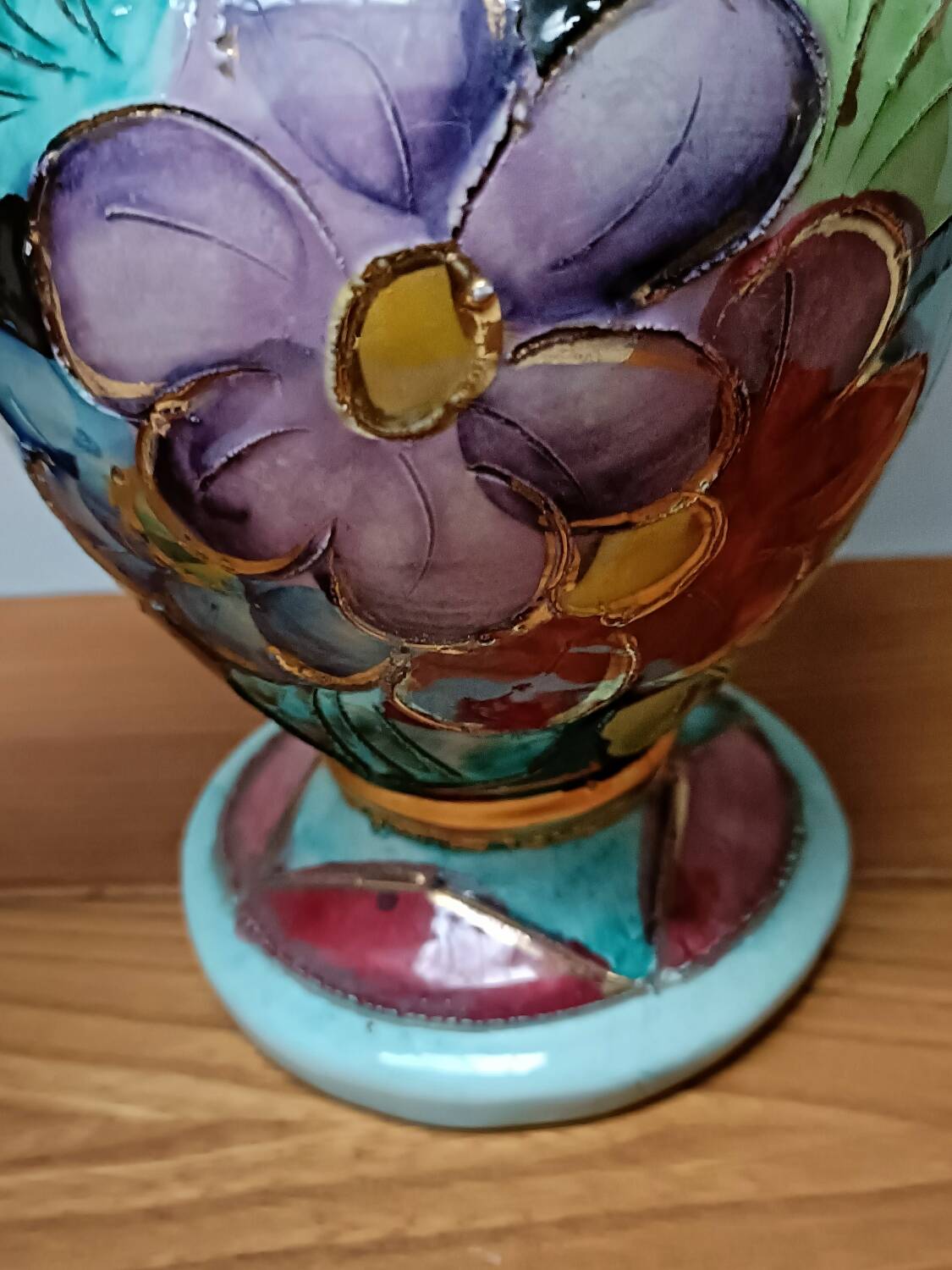 Vallauris vase flowers on black background