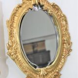 Pair of Louis XV style beveled mirror sconces in bronze by Lucien Gau