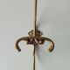 Old coat hook in solid golden brass