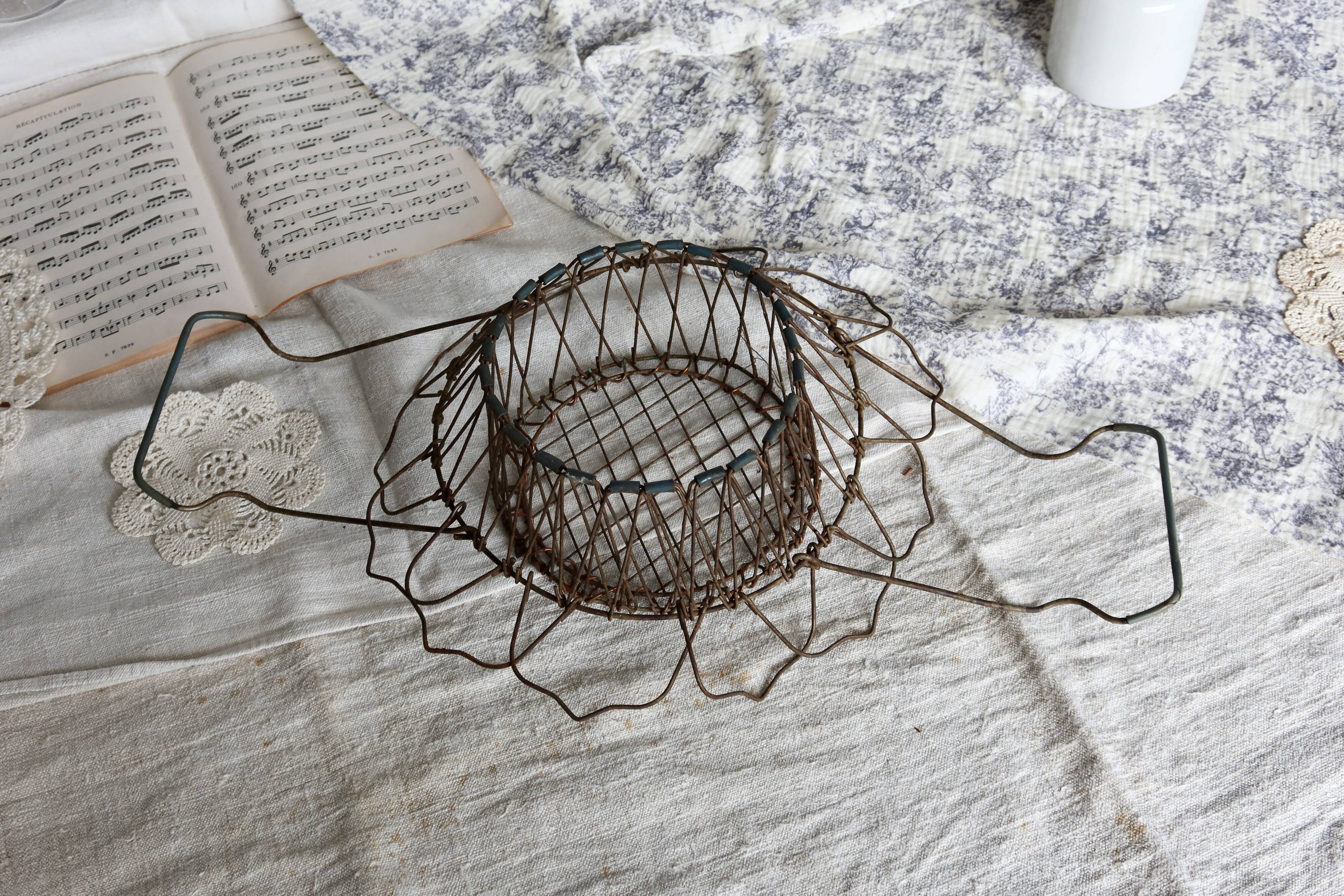 Vintage foldable metal basket in the shape of a flower
