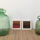 Pair of old demijohn bottles
