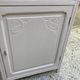 Beautiful art deco jam cupboard in delicate beige tone / and wicker basket