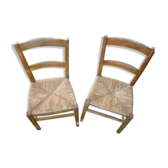 Lot 2 decked blond wooden chairs