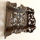 Carved wooden wall shelf