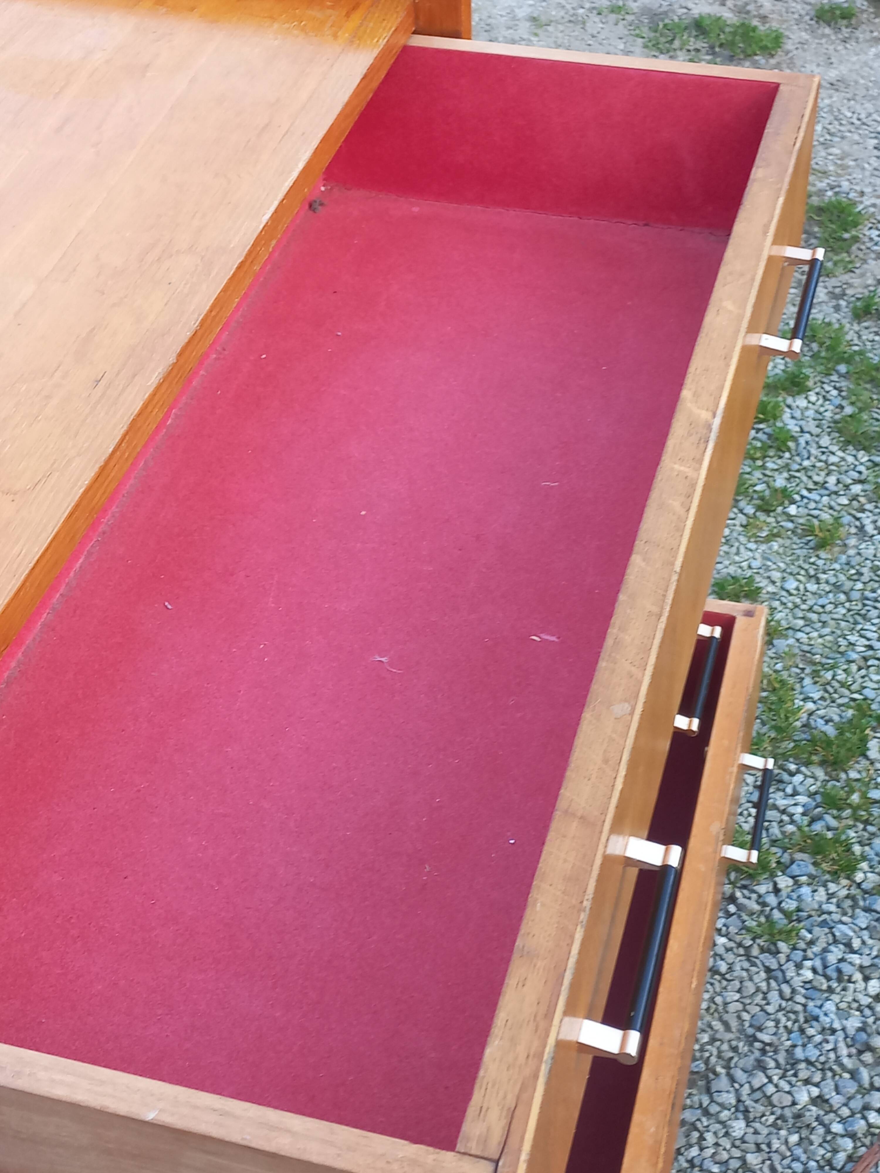 Vintage oak commode with tapered legs and wings from the 1950s.