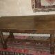 Antique patinated oak dining table, 18th century
