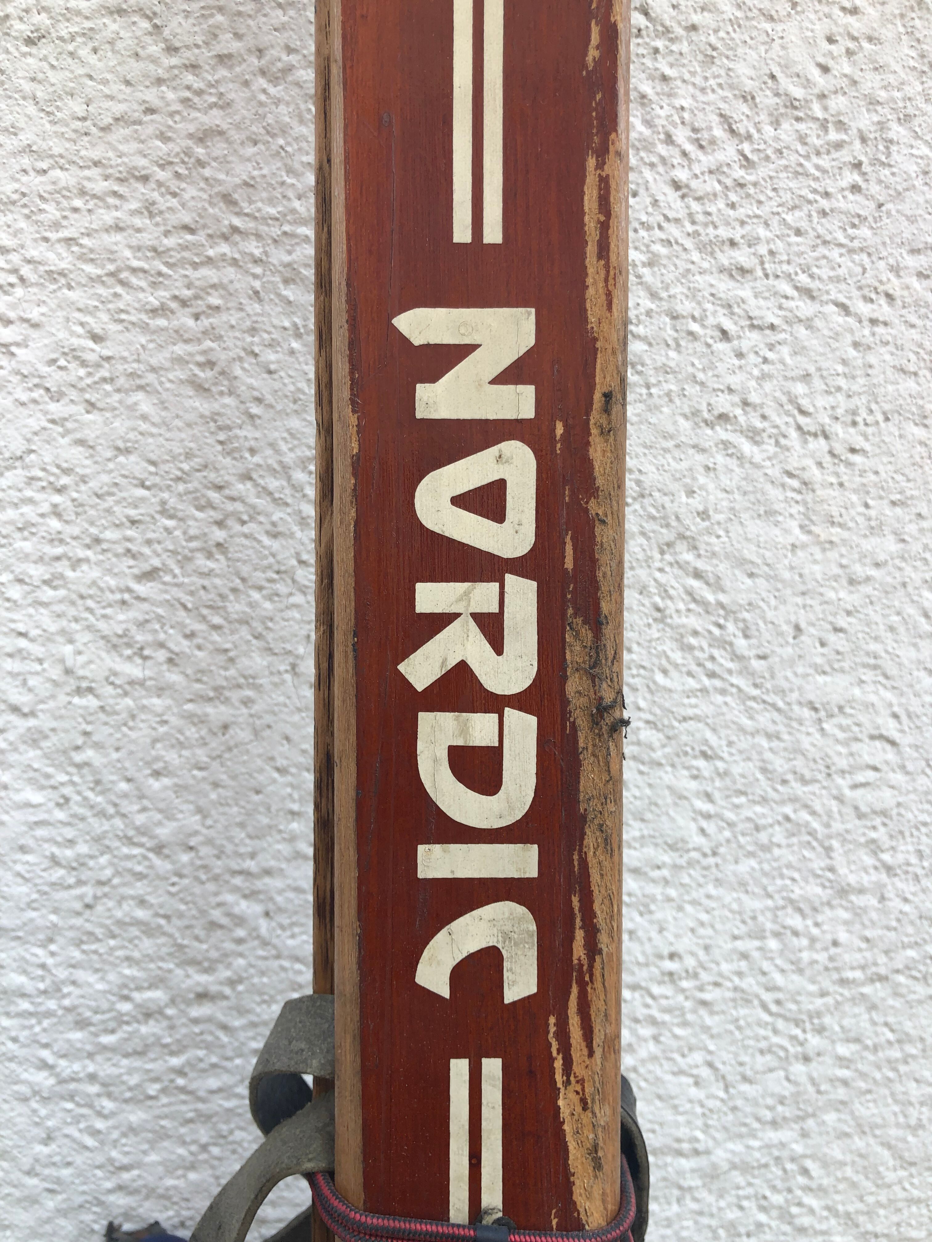 Vintage skis with poles