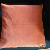 Rust-colored velvet cushion cover