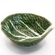 Cabbage leaf cup in green slurry from Portugal