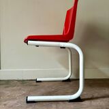 Chaise enfant en métal blanc et plastique rouge