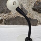 Articulated cream lamp with black plastic arm