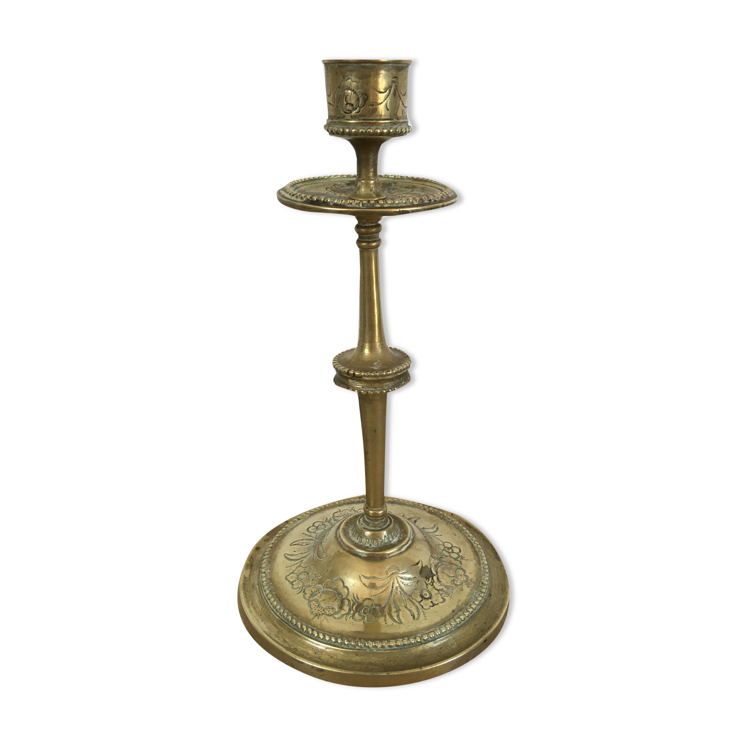Chiseled brass candle holder