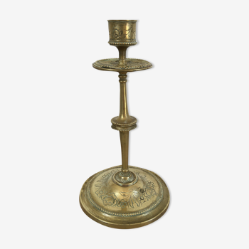 Chiseled brass candle holder