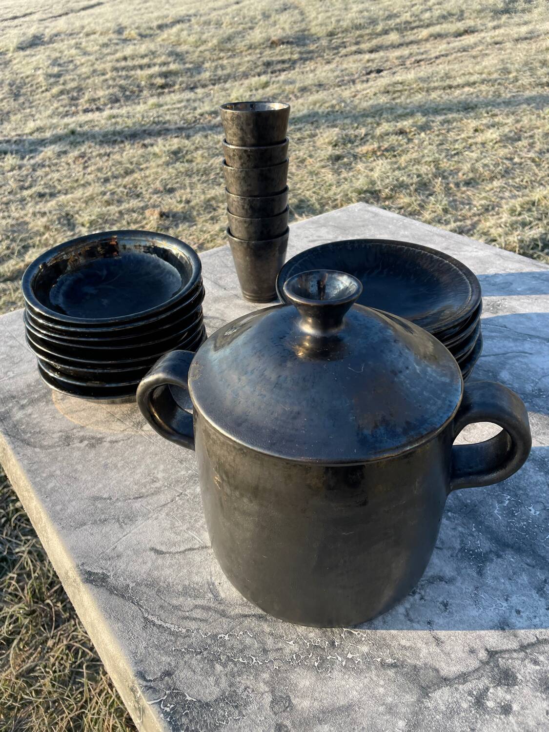Vallauris service, the pottery of the great oak. Black metal glazed ceramics.
