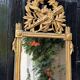 Louis XVI carved and gilded wood mirror, late 18th century