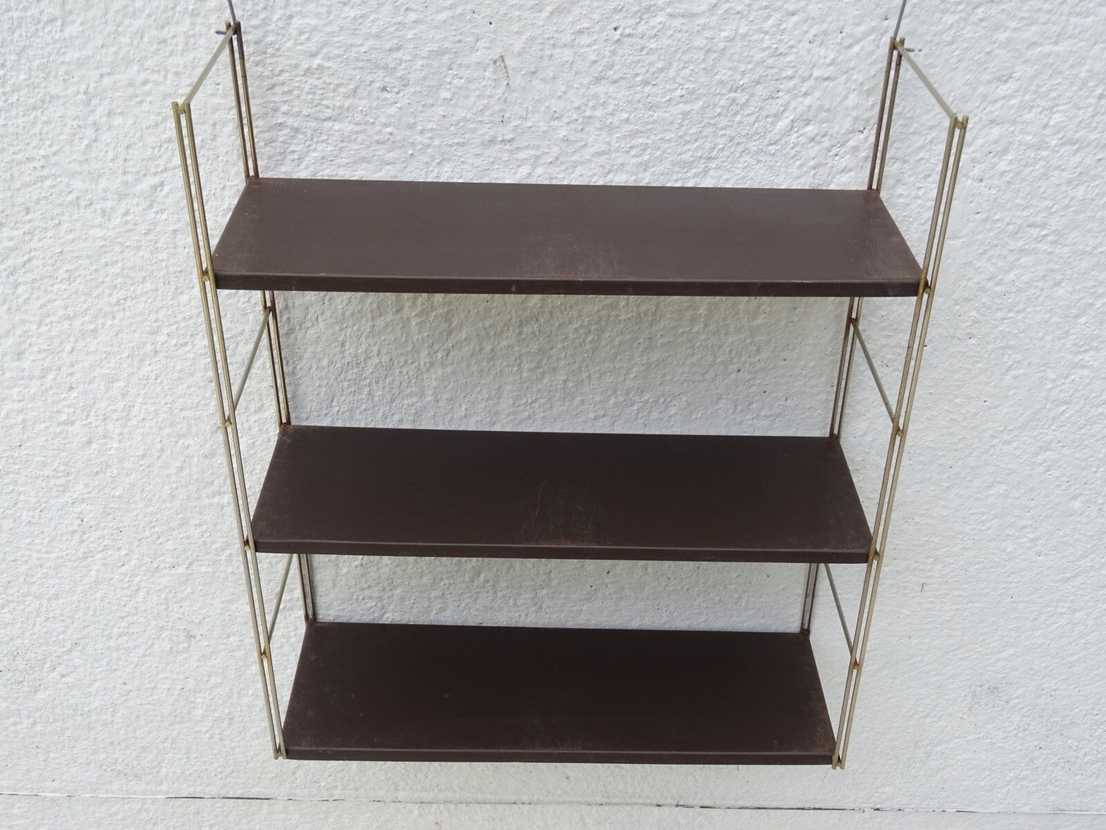 Metal string modular wall shelf