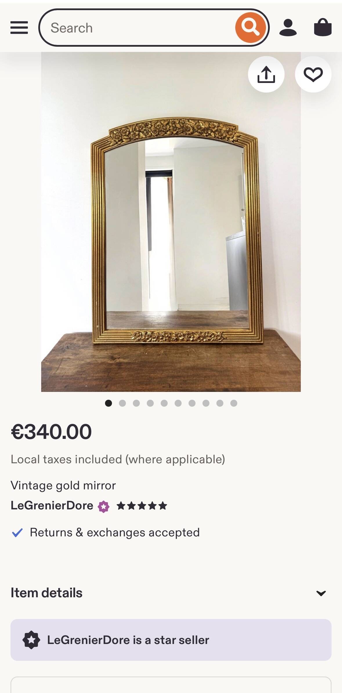 Large vintage gold mirror in Louis XVI style – fluted frame and floral decoration.