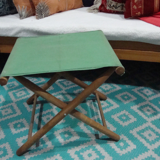 Folding wooden and canvas stool