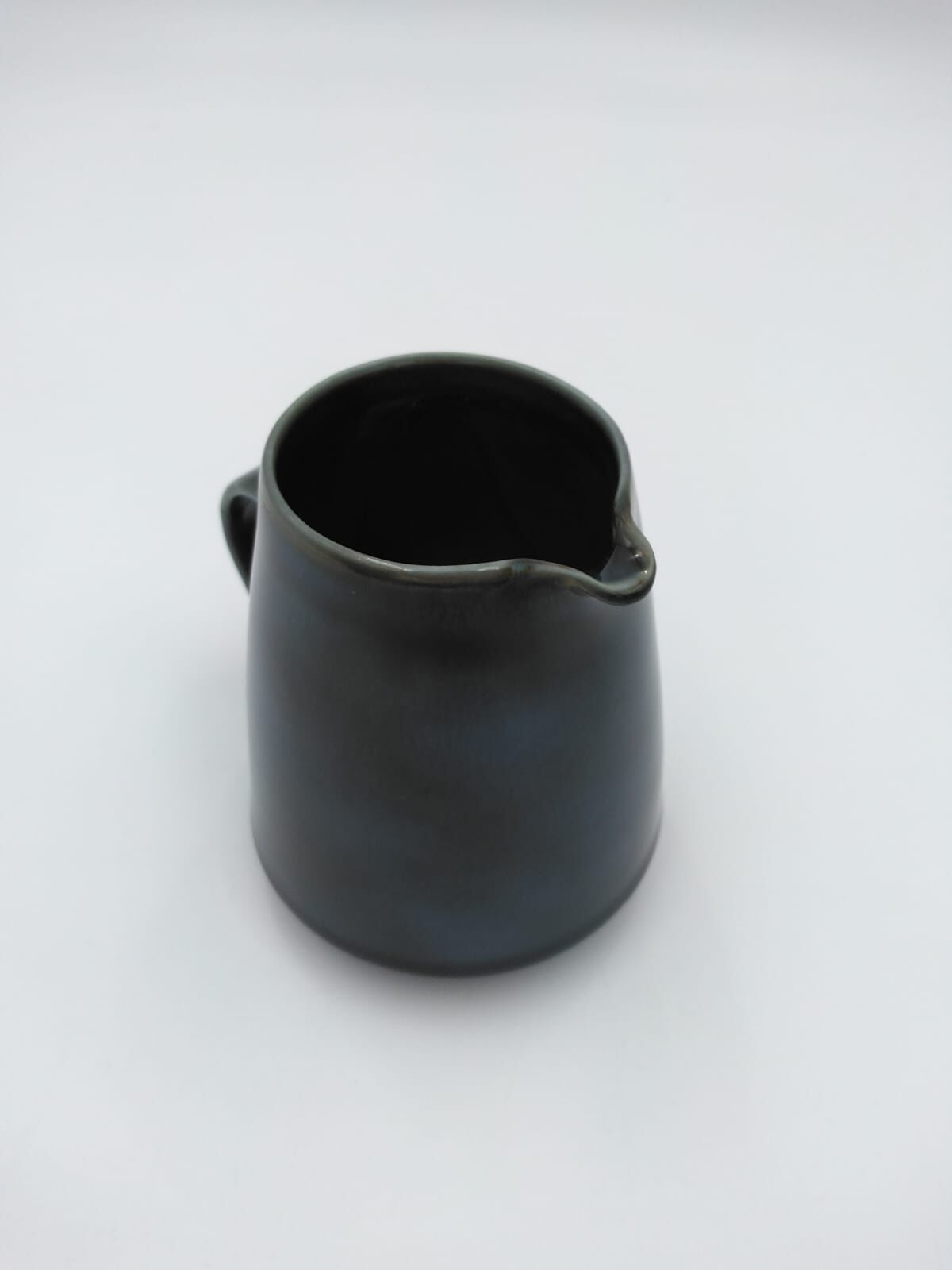 Porcelain pitcher from Virebent