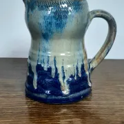 Blue flamed stoneware jug