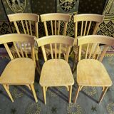 Suite of 6 bistro chairs signed "baumann"