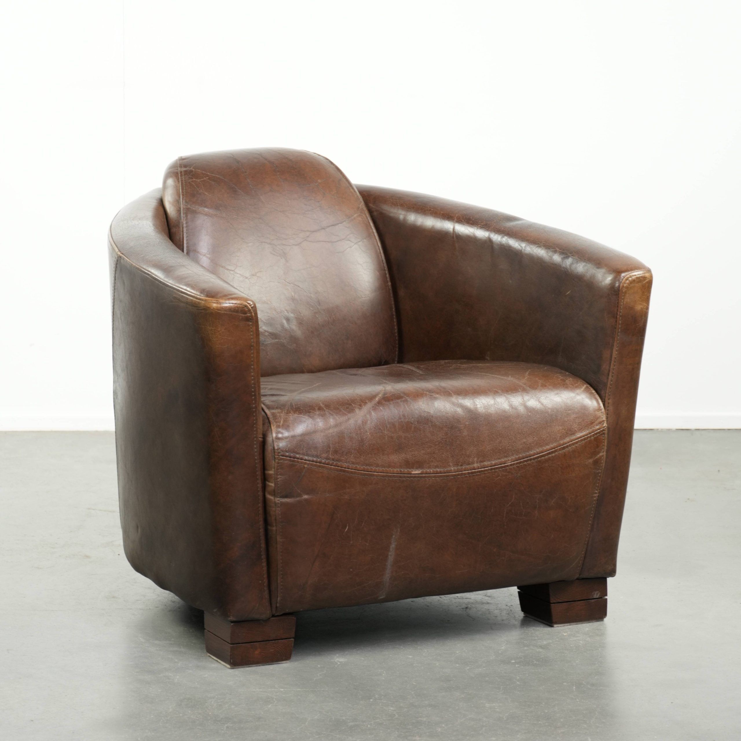 Sturdy dark cognac brown cow leather Aviator design armchair
