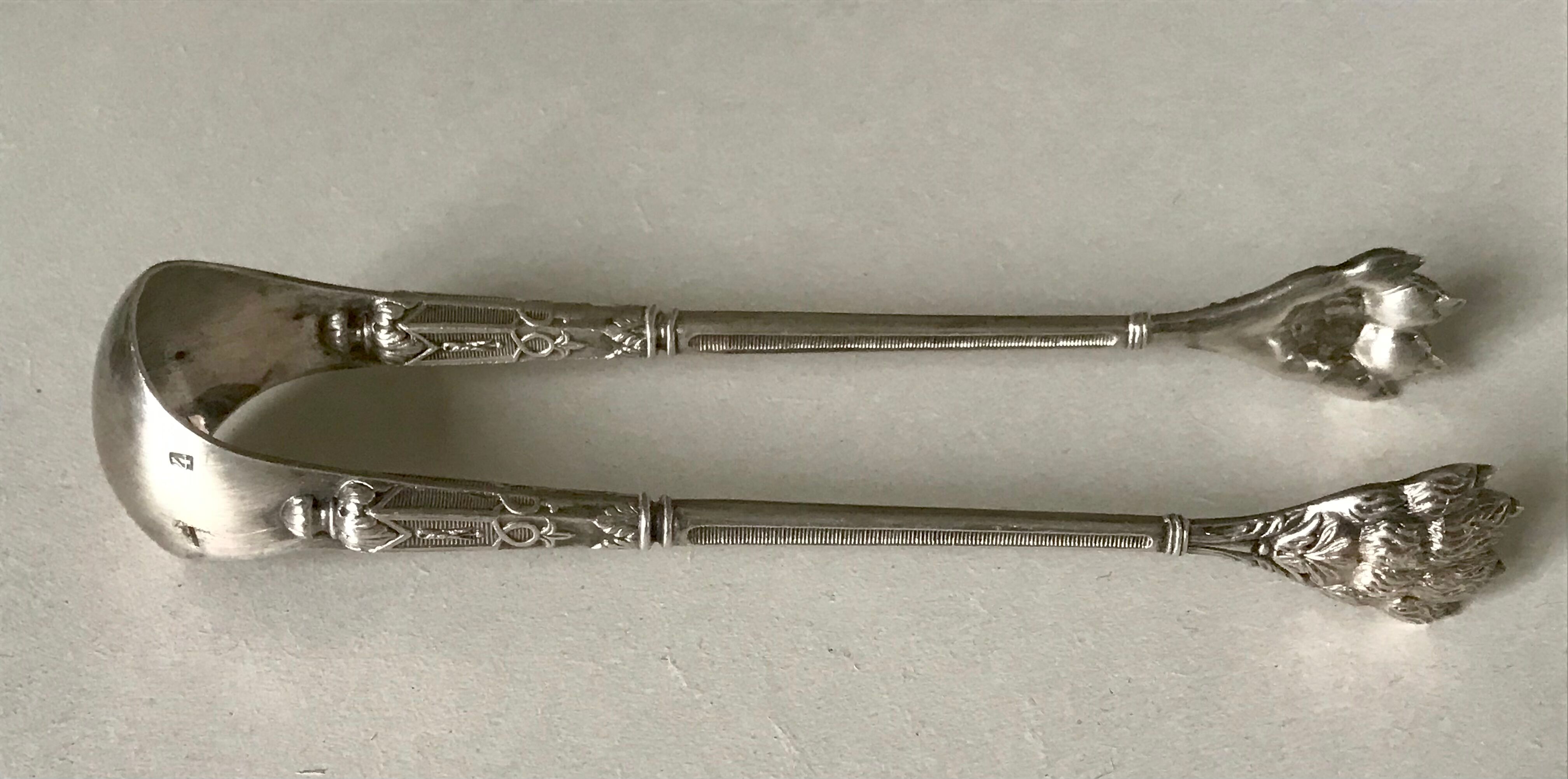 12 teaspoons silver metal