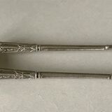 12 teaspoons silver metal