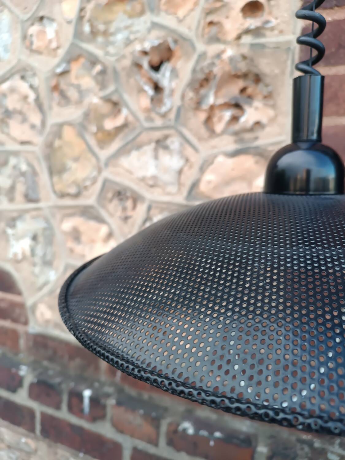 Scandinavian pendant light in perforated sheet metal