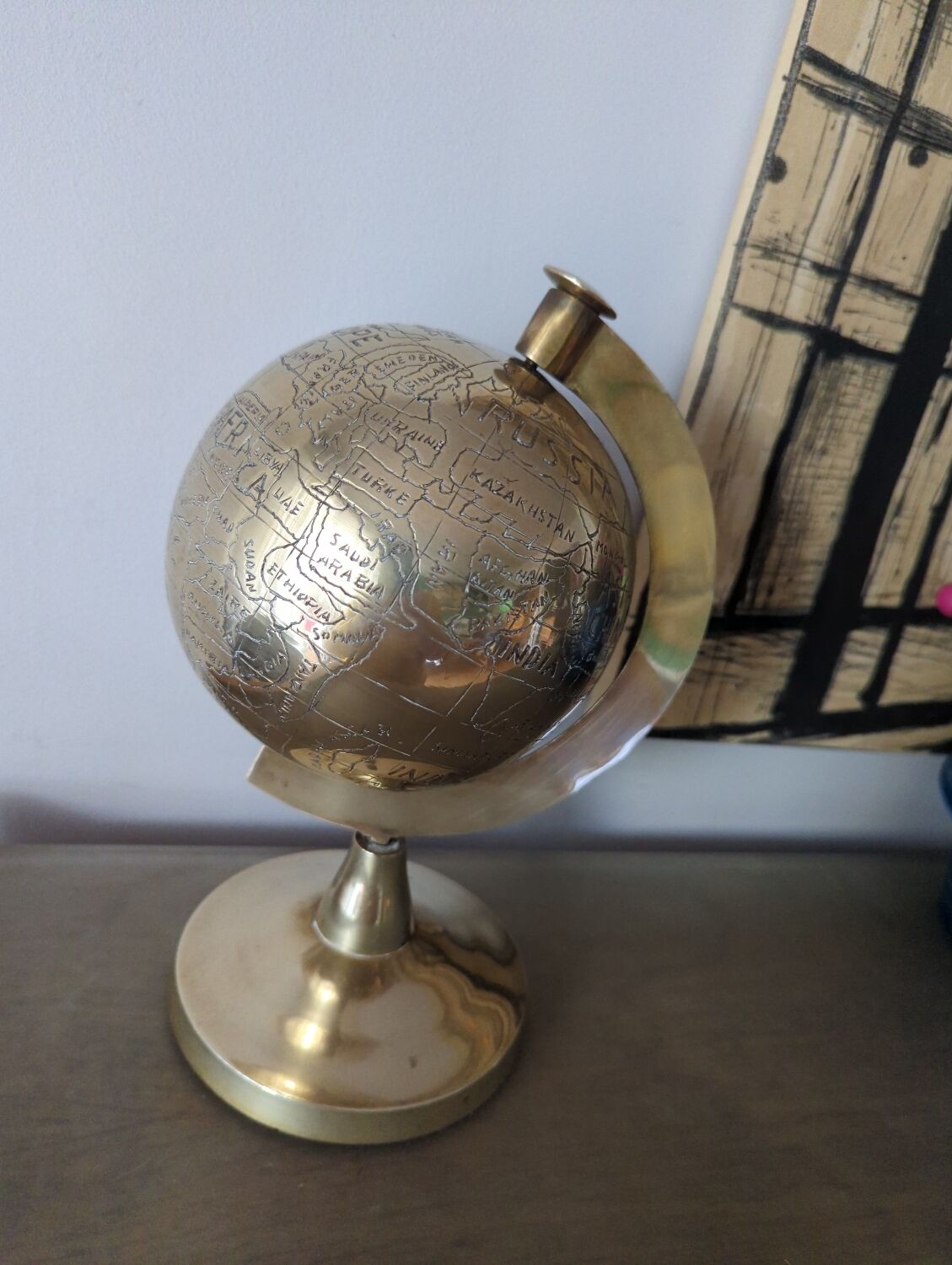 Vintage gilded brass world map