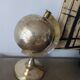 Vintage gilded brass world map