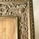 Antique brass metal picture frame in baroque style