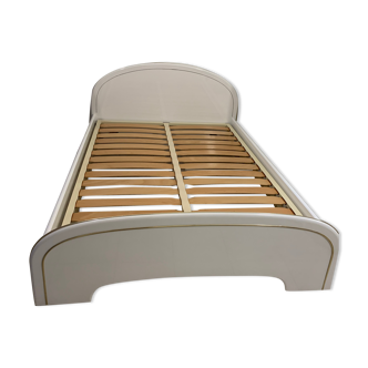 White lacquered bed with gold border with box